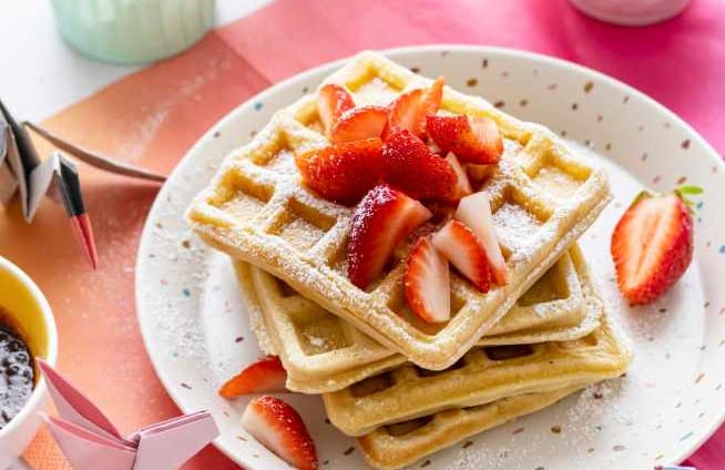  waffles with strawberries on top